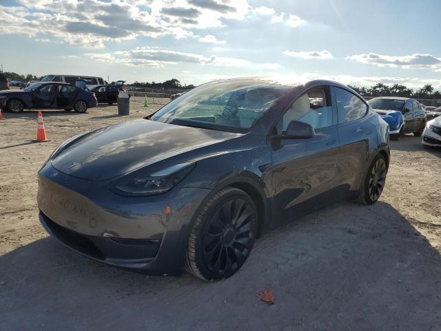 TESLA MODEL Y 2022 with VIN 7SAYGDEFXNF517160 - Photo from auction