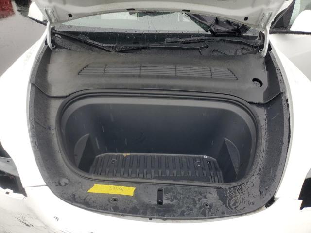 Photo 11 from auction – 2023 TESLA MODEL Y with VIN 7SAYGDEE4PF622433