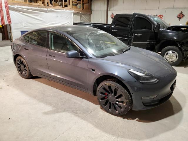 Photo 4 from auction – 2022 TESLA MODEL 3 with VIN 5YJ3E1EC7NF358812