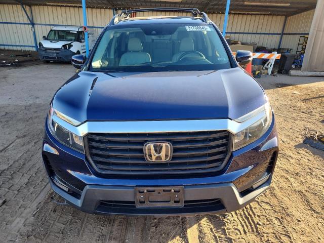 Photo 5 from auction – 2021 HONDA RIDGELINE with VIN 5FPYK3F50MB027196