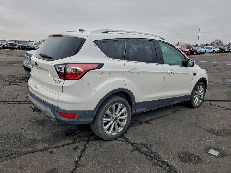 Foto 3 de la subasta – 2017 FORD ESCAPE TIT con VIN 1FMCU9J90HUC50339