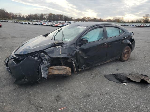 TOYOTA COROLLA L 2018 with VIN 5YFBURHE6JP740242 - Photo from auction