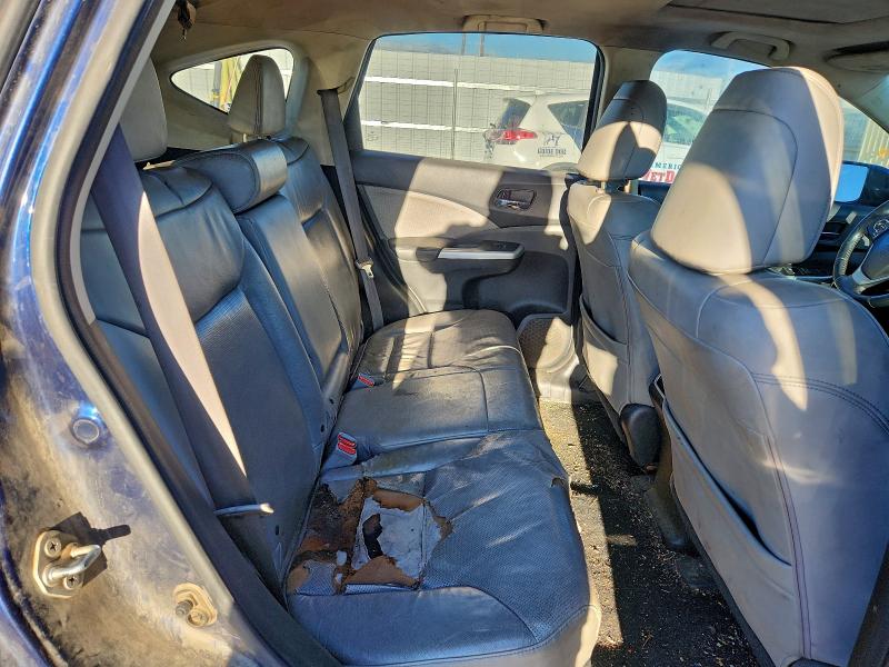 Photo 11 from auction – 2015 HONDA CR-V with VIN 2HKRM4H75FH664147