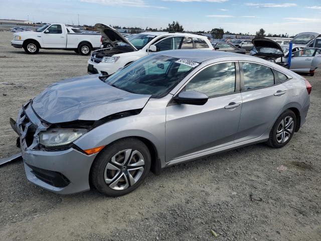 HONDA CIVIC LX 2017 with VIN 19XFC2F51HE205264 - Photo from auction