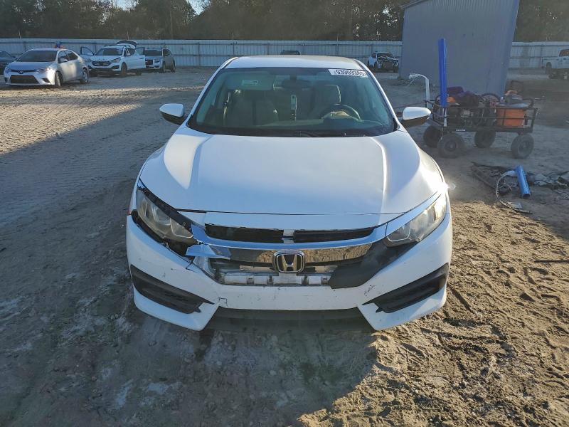 Photo 5 from auction – 2016 HONDA CIVIC LX with VIN 2HGFC2F58GH503380