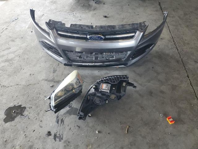 Photo 13 from auction – 2014 FORD ESCAPE TIT with VIN 1FMCU0J99EUB99835