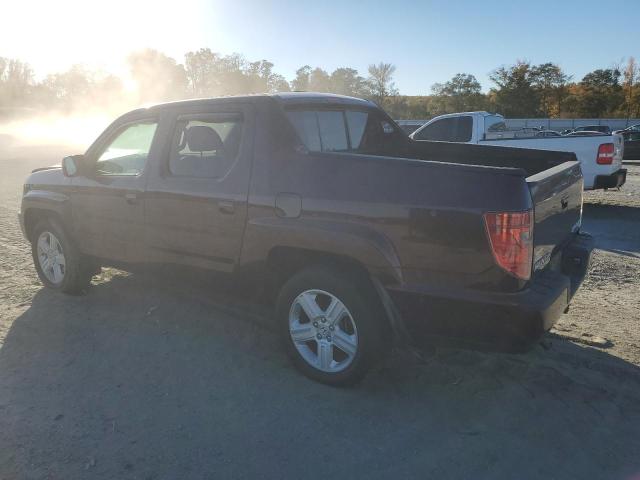 Photo 2 from auction – 2011 HONDA RIDGELINE with VIN 5FPYK1F51BB006679