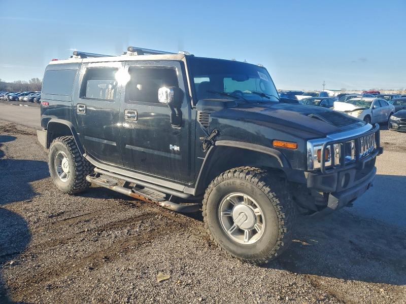 Photo 4 from auction – 2003 HUMMER H2 with VIN 5GRGN23U53H113795