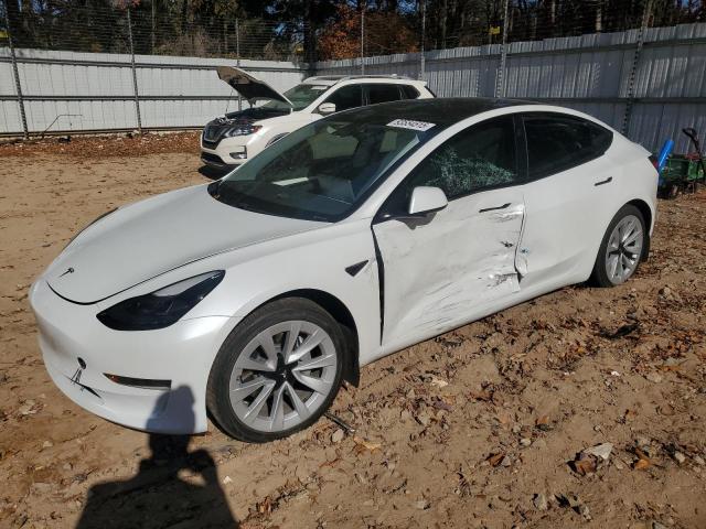 TESLA MODEL 3 2021 with VIN 5YJ3E1EA2MF061587 - Photo from auction