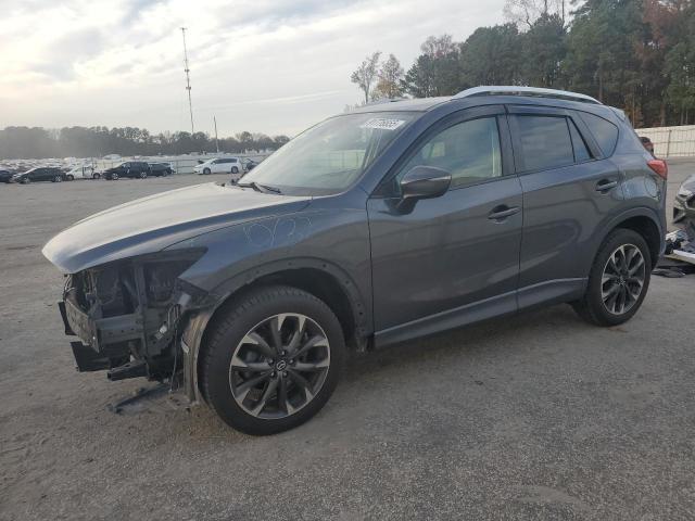 MAZDA CX-5 GT 2016 with VIN JM3KE2DY5G0802213 - Photo from auction
