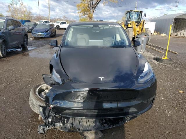 Photo 5 from auction – 2023 TESLA MODEL Y with VIN LRWYGDFDXPC227735