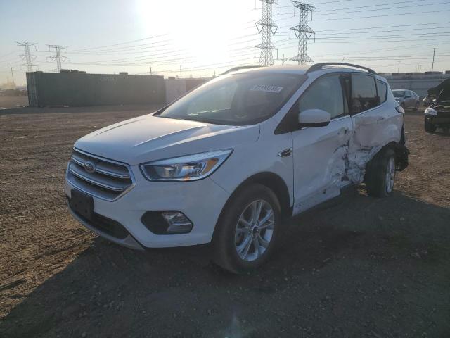 FORD ESCAPE SE 2018 with VIN 1FMCU9GD4JUB59107 - Photo from auction