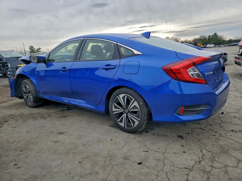 Photo 2 from auction – 2018 HONDA CIVIC EX with VIN JHMFC1F32JX019987