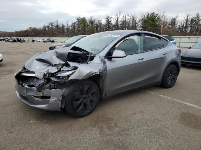 TESLA MODEL Y 2024 with VIN 7SAYGDEE4RA310564 - Photo from auction