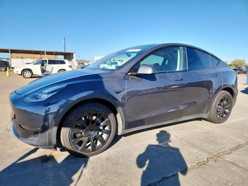 TESLA MODEL Y 2021 with VIN 5YJYGAEE9MF207809 - Photo from auction