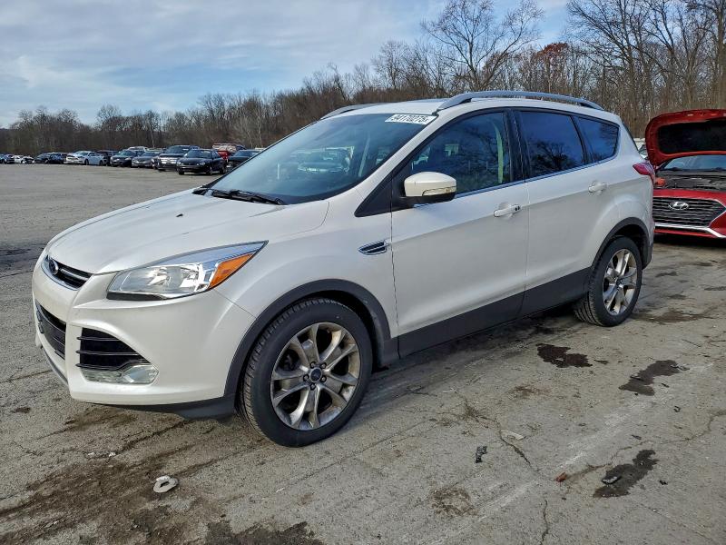 FORD ESCAPE TIT 2016 with VIN 1FMCU0JX0GUA63224 - Photo from auction
