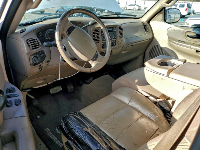 Photo 8 from auction – 2002 FORD F150 with VIN 1FTRX17L12NA75756