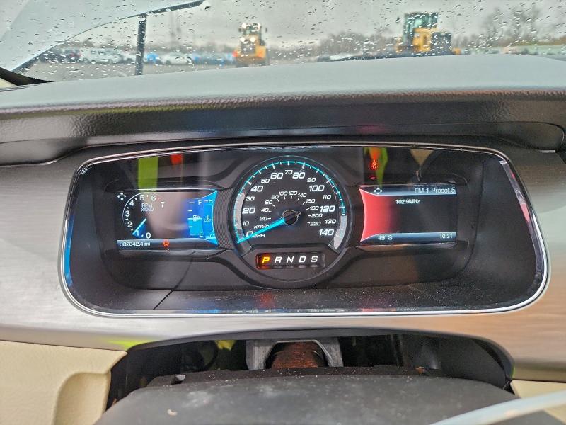 Photo 9 from auction – 2014 FORD TAURUS SEL with VIN 1FAHP2E84EG110532