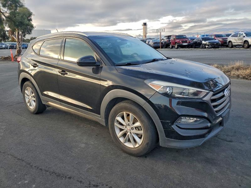 Photo 4 from auction – 2016 HYUNDAI TUCSON with VIN KM8J33A41GU088280