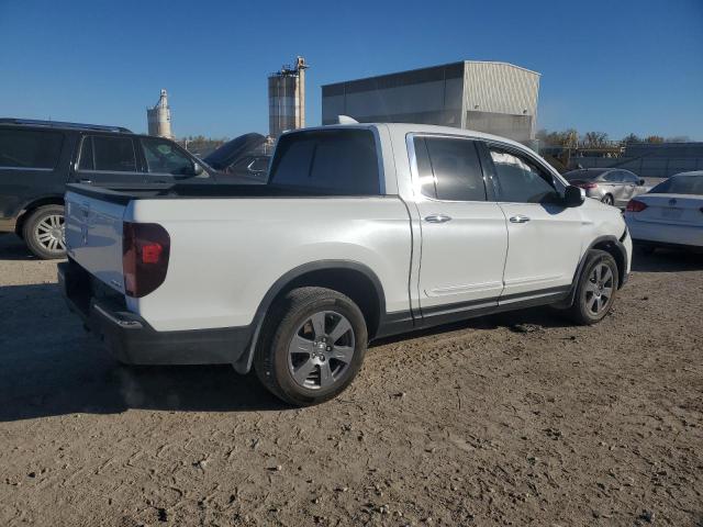 Photo 3 from auction – 2020 HONDA RIDGELINE with VIN 5FPYK3F75LB003749