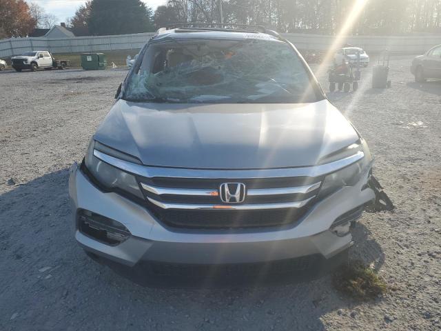 Photo 5 from auction – 2016 HONDA PILOT EXL with VIN 5FNYF5H53GB039997