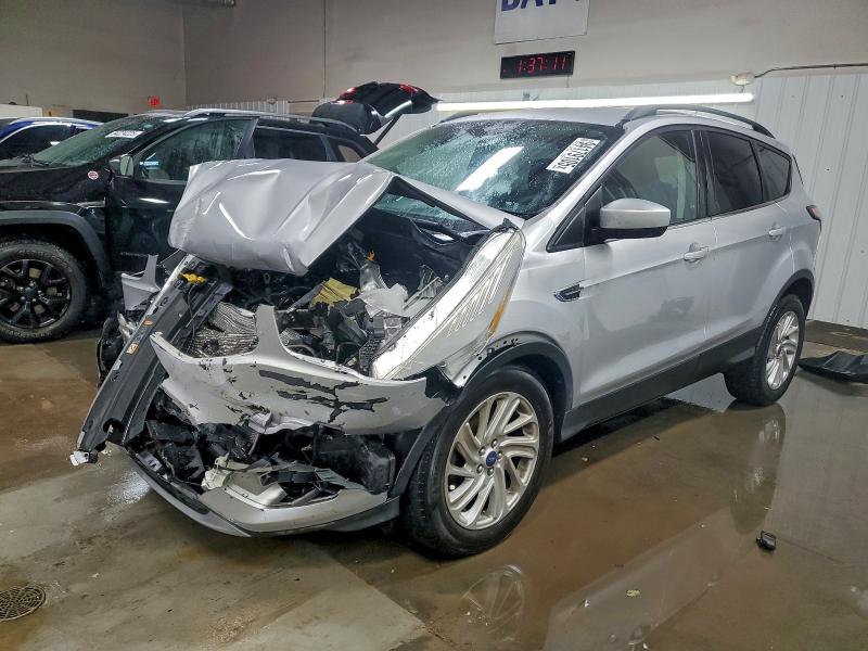 FORD ESCAPE SE 2018 with VIN 1FMCU0GD9JUA02460 - Photo from auction