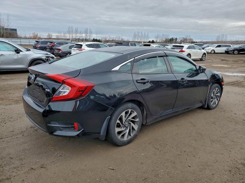 Photo 3 from auction – 2018 HONDA CIVIC LX with VIN 2HGFC2F6XJH033093