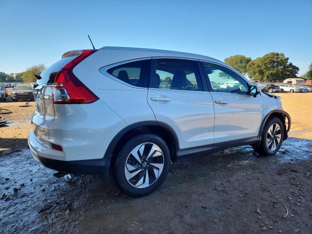 Photo 3 from auction – 2015 HONDA CR-V TOURI with VIN 5J6RM3H96FL026653