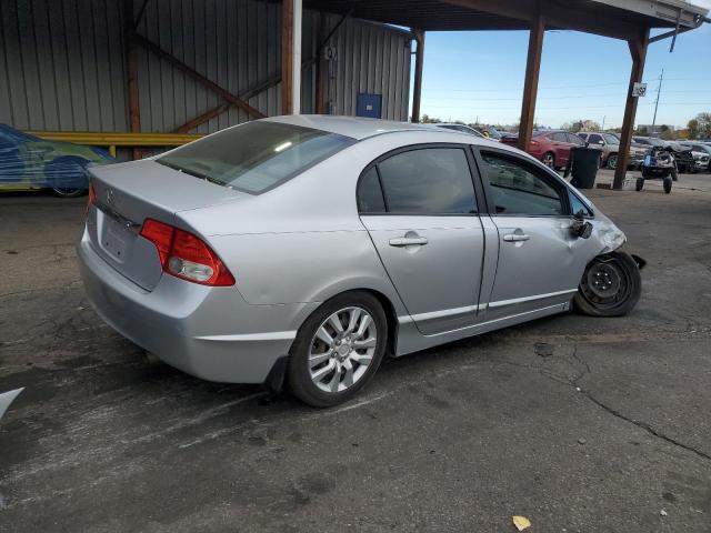 Photo 3 from auction – 2011 HONDA CIVIC LX with VIN 19XFA1F53BE047761