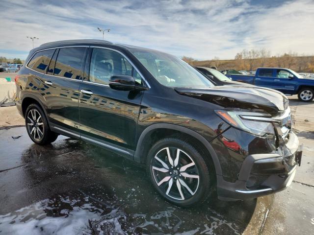 Photo 4 from auction – 2022 HONDA PILOT ELIT with VIN 5FNYF6H05NB037627