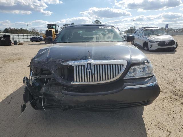 Photo 5 from auction – 2004 LINCOLN TOWN CAR with VIN 1LNHM83W74Y686675