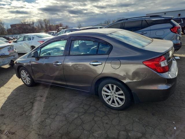 Photo 2 from auction – 2012 HONDA CIVIC EXL with VIN 2HGFB2F92CH552459