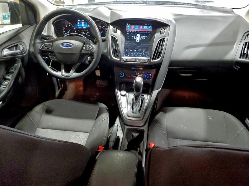 Photo 8 from auction – 2015 FORD FOCUS SE with VIN 1FADP3K29FL303837