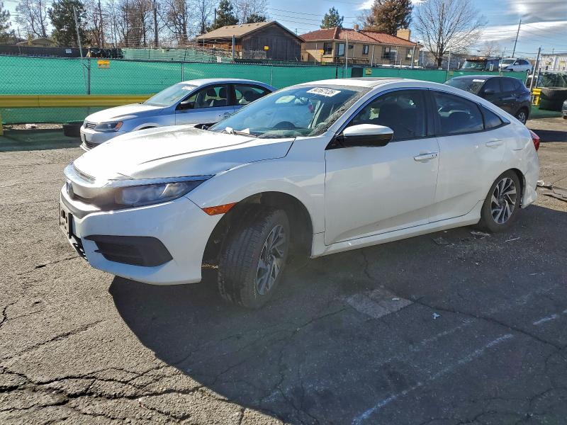 HONDA CIVIC EX 2017 with VIN 19XFC2F77HE007435 - Photo from auction