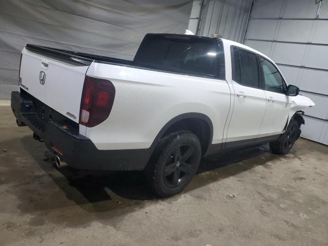 Photo 3 from auction – 2023 HONDA RIDGELINE with VIN 5FPYK3F88PB034606