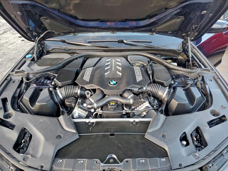 Photo 11 from auction – 2022 BMW M550XI with VIN WBA13BK05NCJ60379