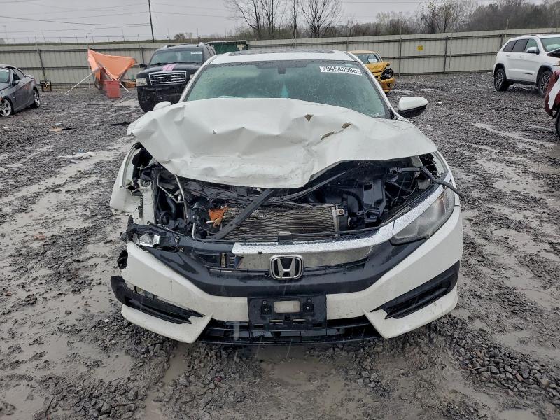 Photo 5 from auction – 2016 HONDA CIVIC EX with VIN 2HGFC2F76GH575812