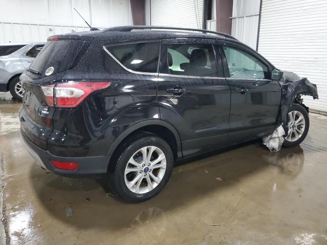 Photo 3 from auction – 2017 FORD ESCAPE SE with VIN 1FMCU9GDXHUD99501