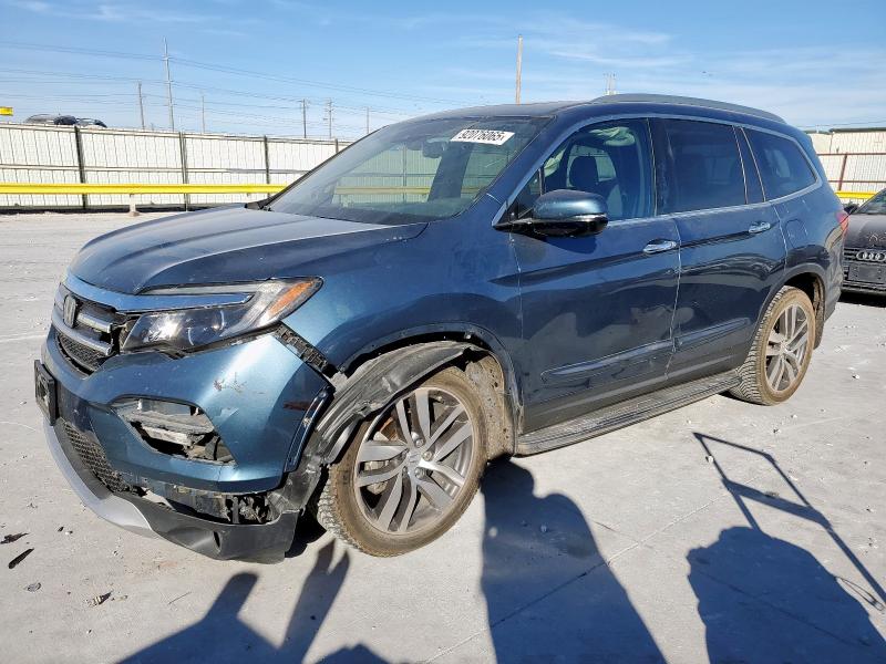 HONDA PILOT ELIT 2016 with VIN 5FNYF6H04GB017646 - Photo from auction