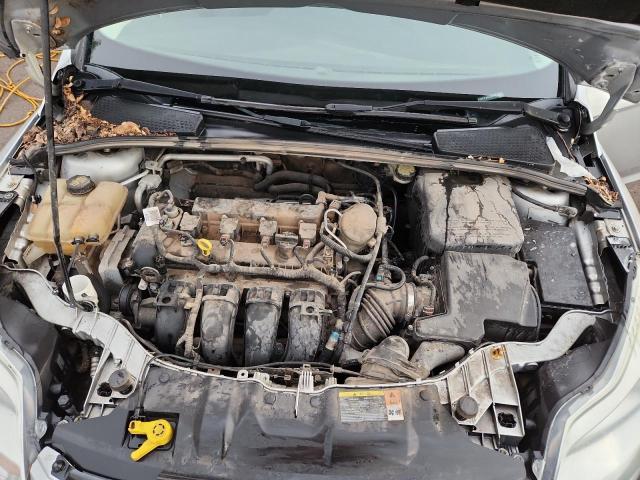 Photo 11 from auction – 2014 FORD FOCUS SE with VIN 1FADP3F24EL255771