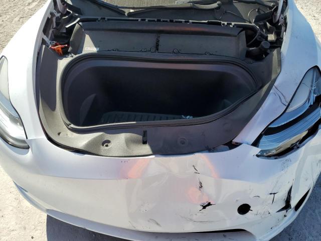 Photo 11 from auction – 2023 TESLA MODEL Y with VIN 7SAYGDEE4PA025098