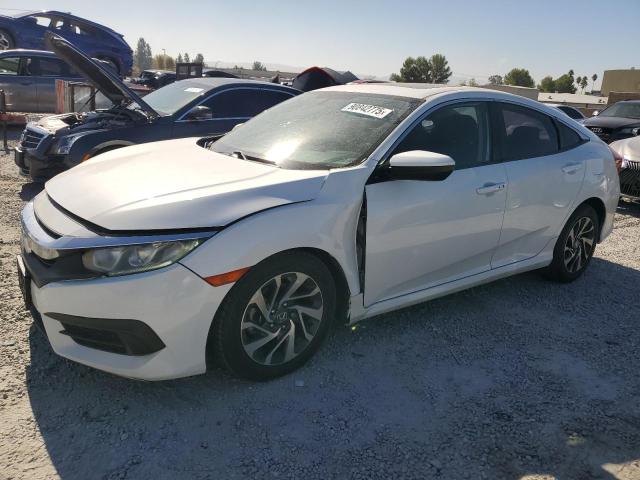 HONDA CIVIC EX 2018 with VIN 2HGFC2F75JH571810 - Photo from auction