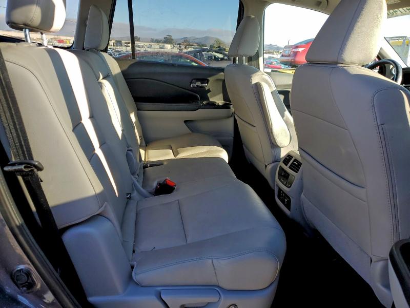 Photo 11 from auction – 2018 HONDA PILOT TOUR with VIN 5FNYF5H98JB009193