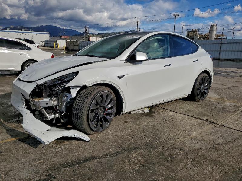 TESLA MODEL Y 2022 with VIN 7SAYGDEF5NF390415 - Photo from auction
