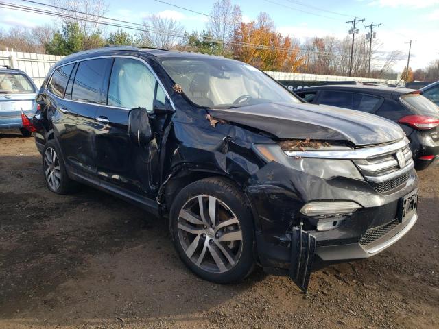 Photo 4 from auction – 2016 HONDA PILOT TOUR with VIN 5FNYF6H94GB097187
