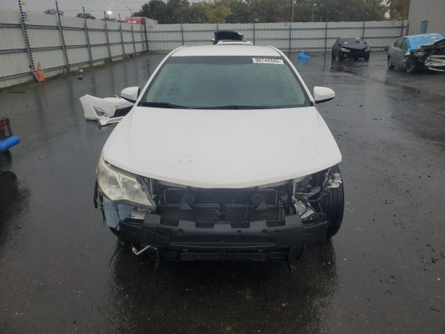 Photo 5 from auction – 2012 TOYOTA CAMRY HYBR with VIN 4T1BD1FK4CU016495