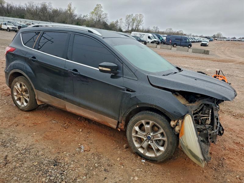 Photo 4 from auction – 2014 FORD ESCAPE TIT with VIN 1FMCU9J9XEUE35526