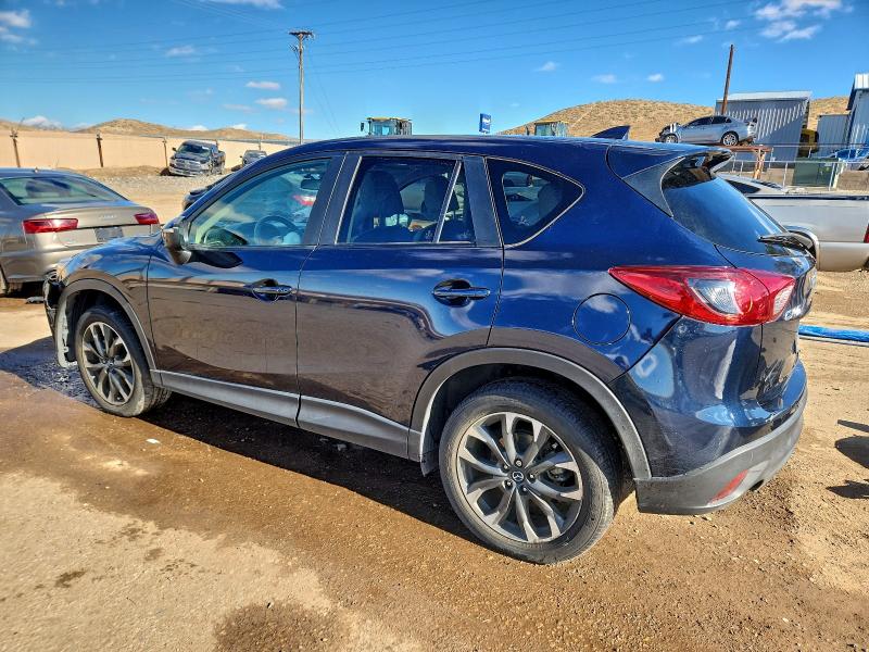 Photo 2 from auction – 2016 MAZDA CX-5 with VIN JM3KE2DY2G0915777