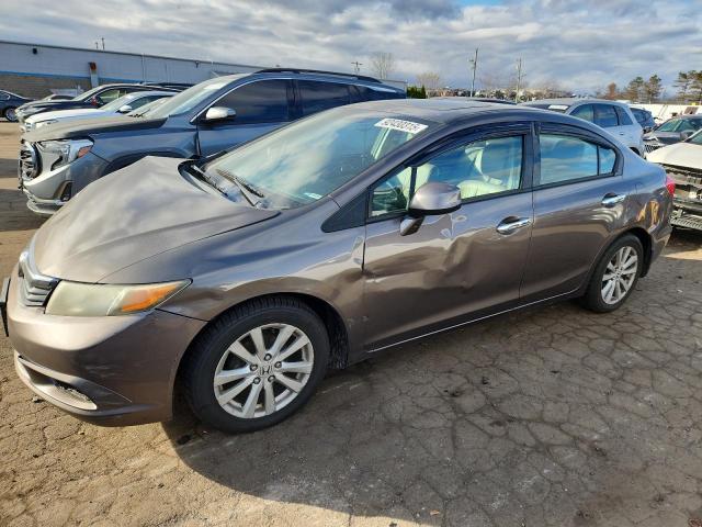 HONDA CIVIC EXL 2012 with VIN 2HGFB2F92CH552459 - Photo from auction