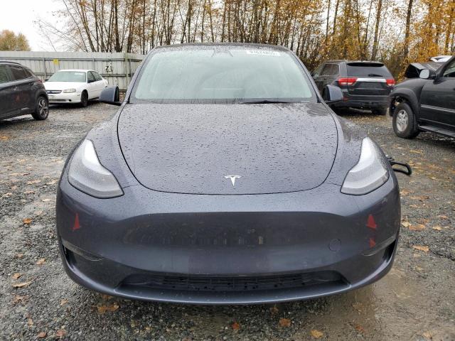 Photo 5 from auction – 2022 TESLA MODEL Y with VIN 7SAYGAEE4NF560429